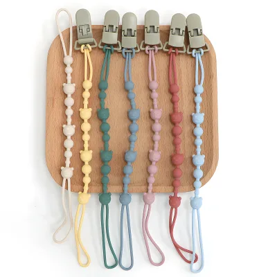 Attache-tétine en silicone pour poussette