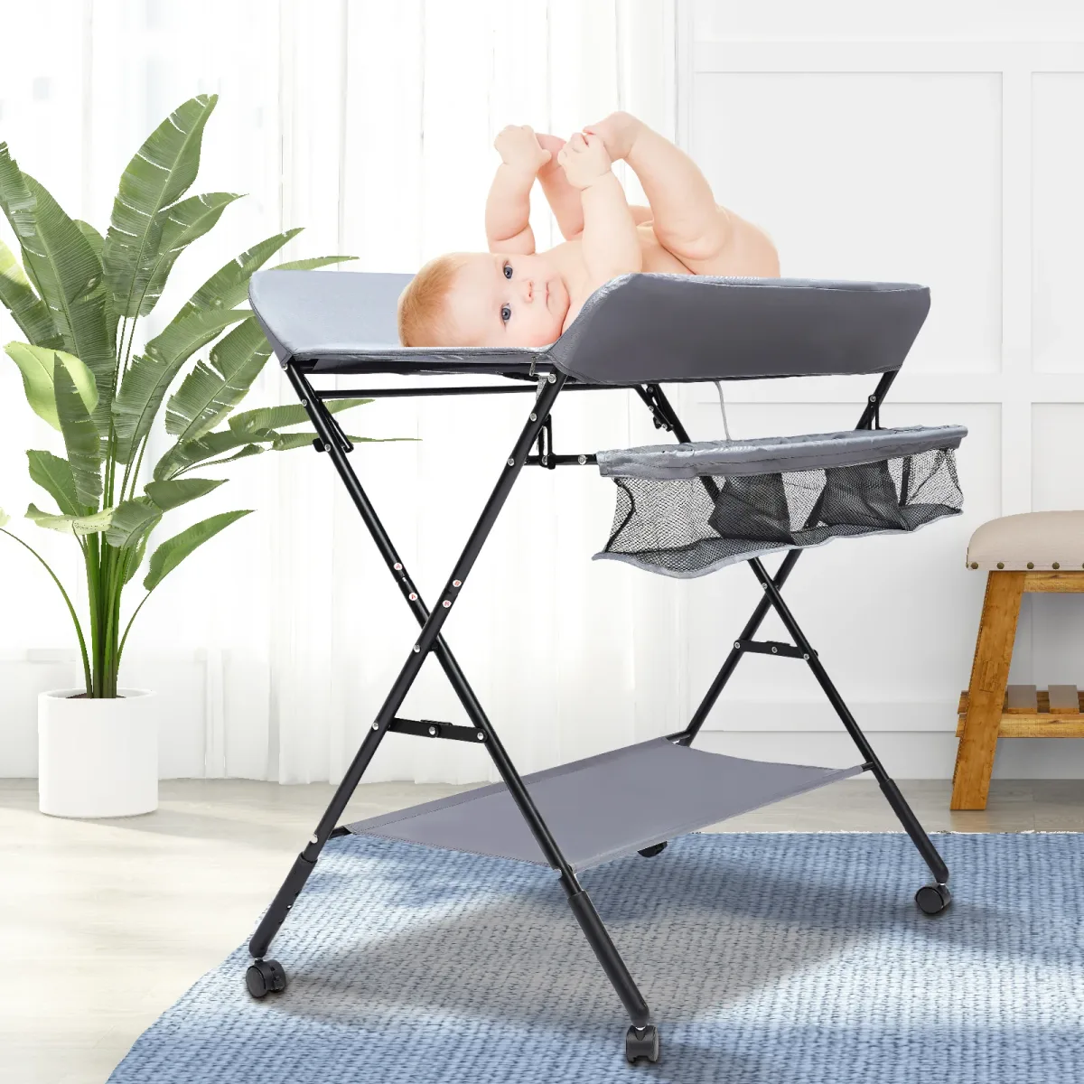 Table à langer pliante grise sur roulettes